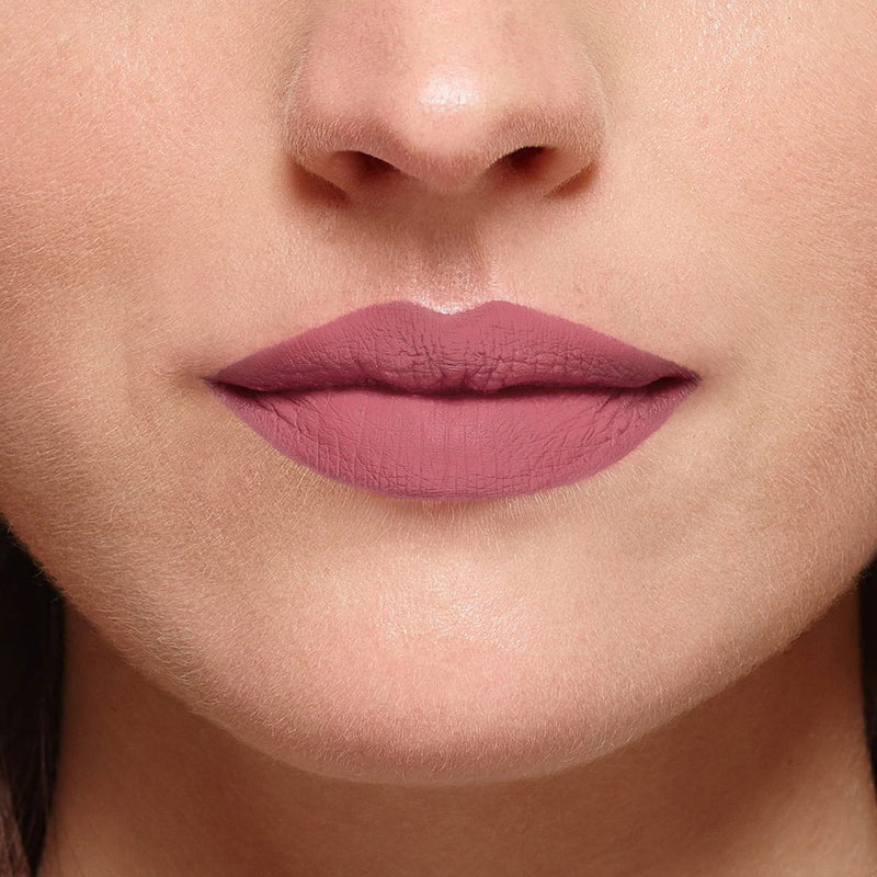 Close-up of a woman's lips wearing a pink lipstick L'Oreal Paris Color Riche Intense Volume Matte Lipstick 482 Le Mauve Indomptable