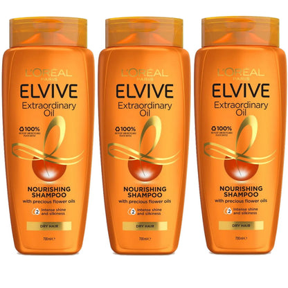 Three bottles of L'Oreal Elvive Extraordinary Oil shampoo on a white background