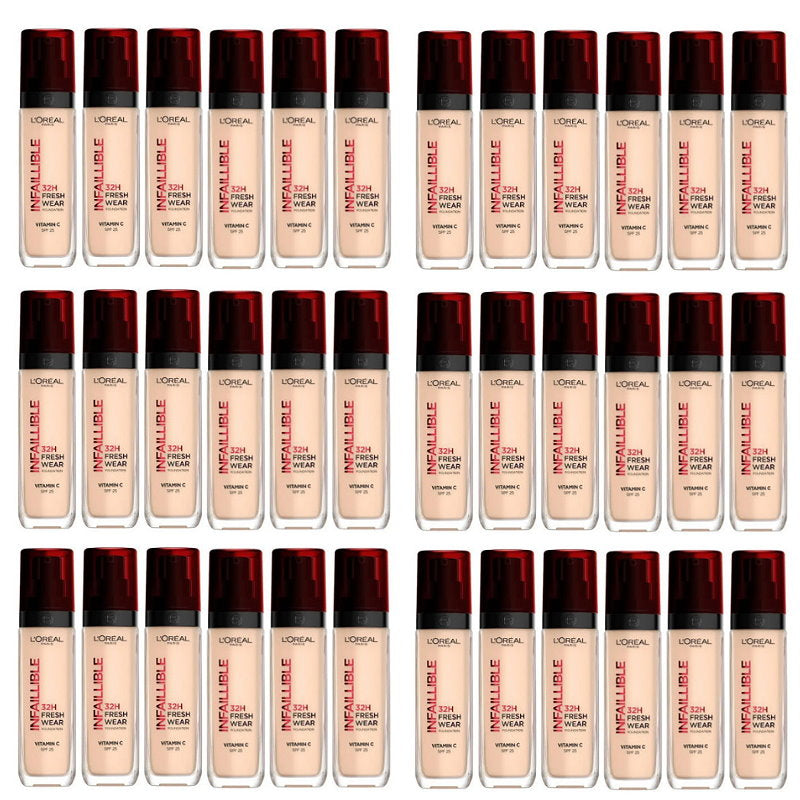 Multiple bottles of L'Oreal Infallible foundation with red caps on a white background