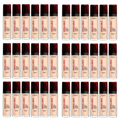 Multiple bottles of L'Oreal Infallible foundation with red caps on a white background