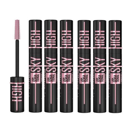 Set of Lash Sensational Sky High mascara tubes with a brush on a white background