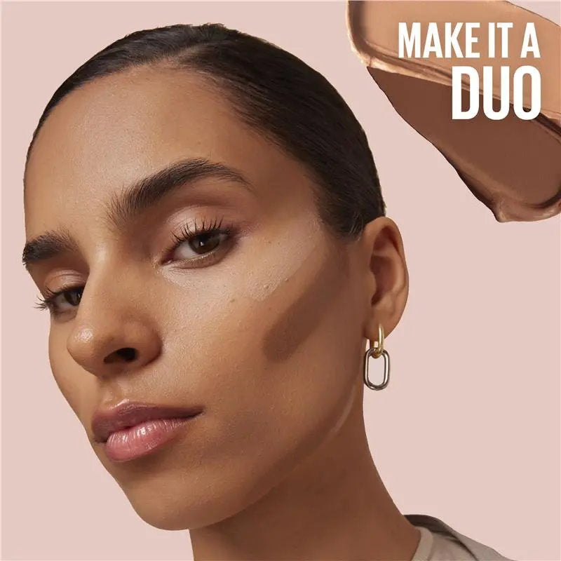 Woman's face with makeup application and a compact powder case on a pink background Makeup Warehouse Australia 
