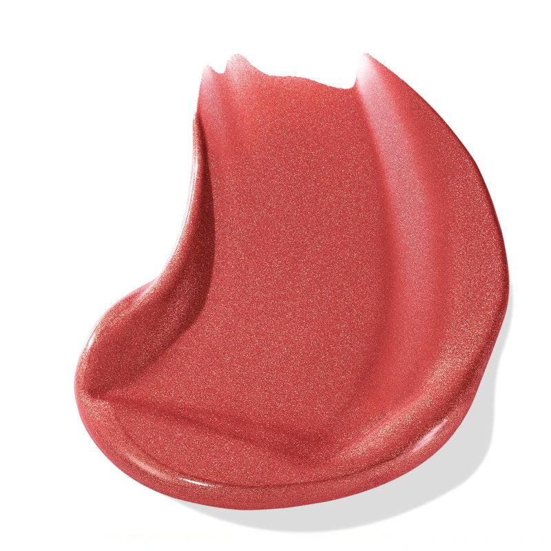 Close-up of a swatch of red lipstick on a white background