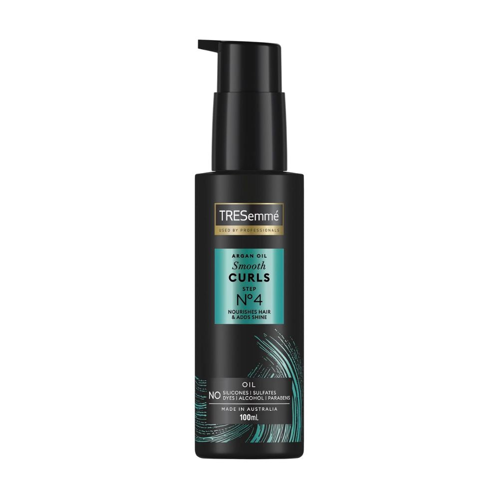 TRESemmé hair oil bottle on a white background